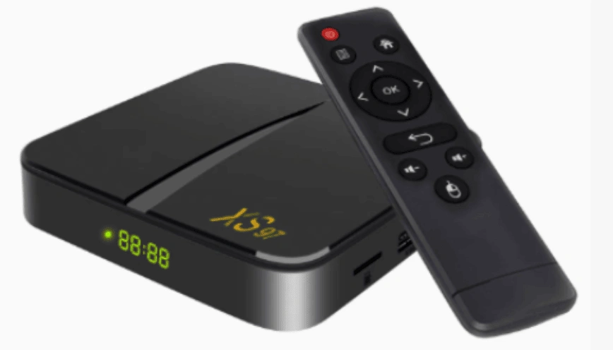 Top 5 best Android TV boxes and remotes for streaming and gaming in 2025 displayed on a wooden surface.